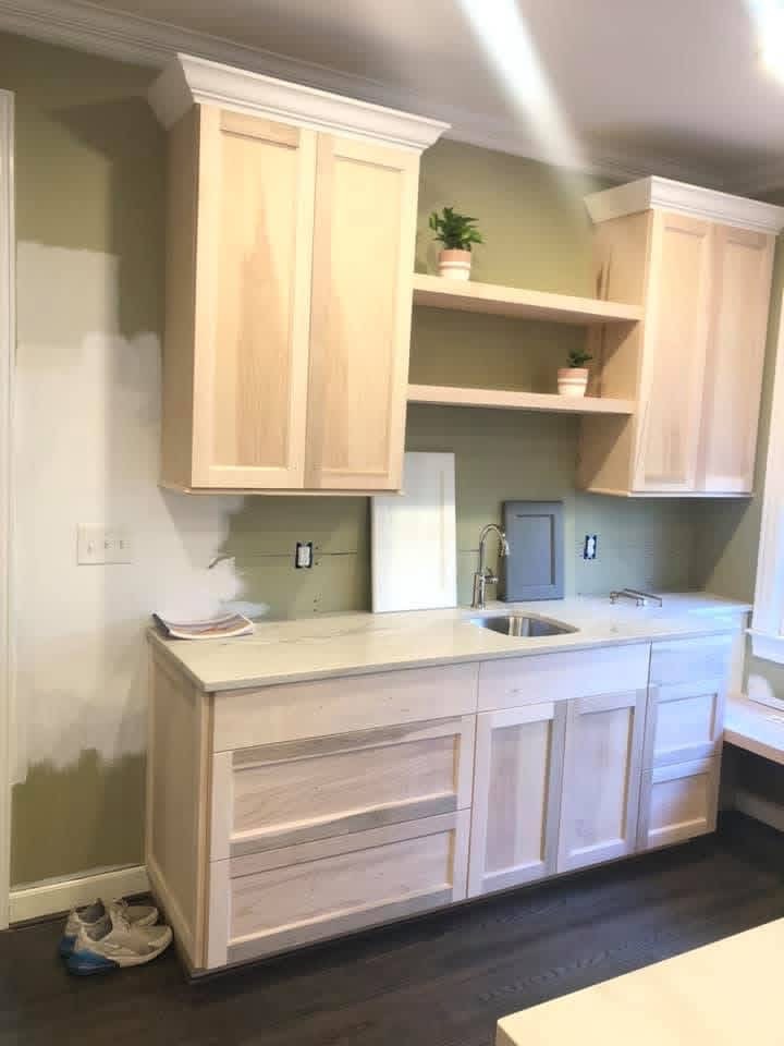 Custom cabinet and beverage station before painting