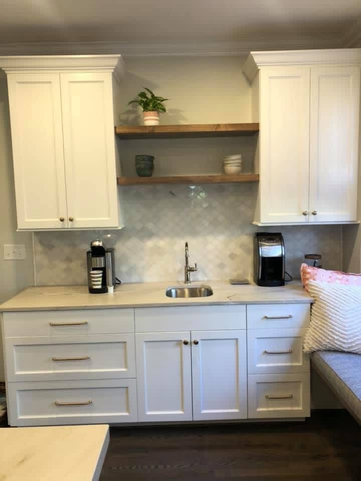Detailed professionally sprayed cabinet finish by Carlton Custom Painting